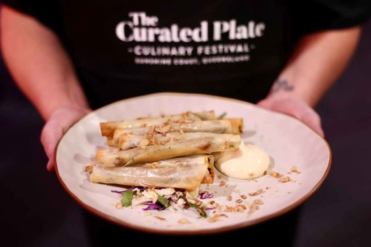 The Curated Plate 2026 food festival with regional produce and chef plating at a Sunshine Coast venue