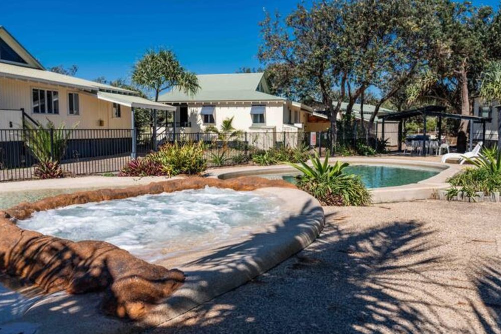 Shared swimming pool and outdoor spa in the grounds at Fraser Island Beach Houses